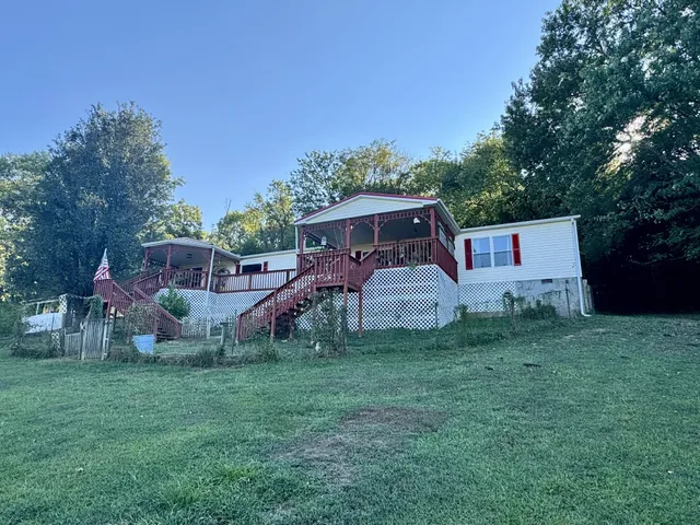 a view of swimming pool from a yard
