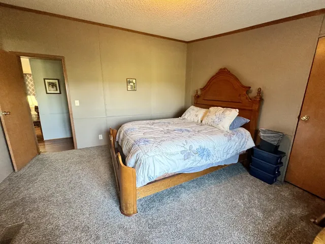 a room with lots of furniture and clutter