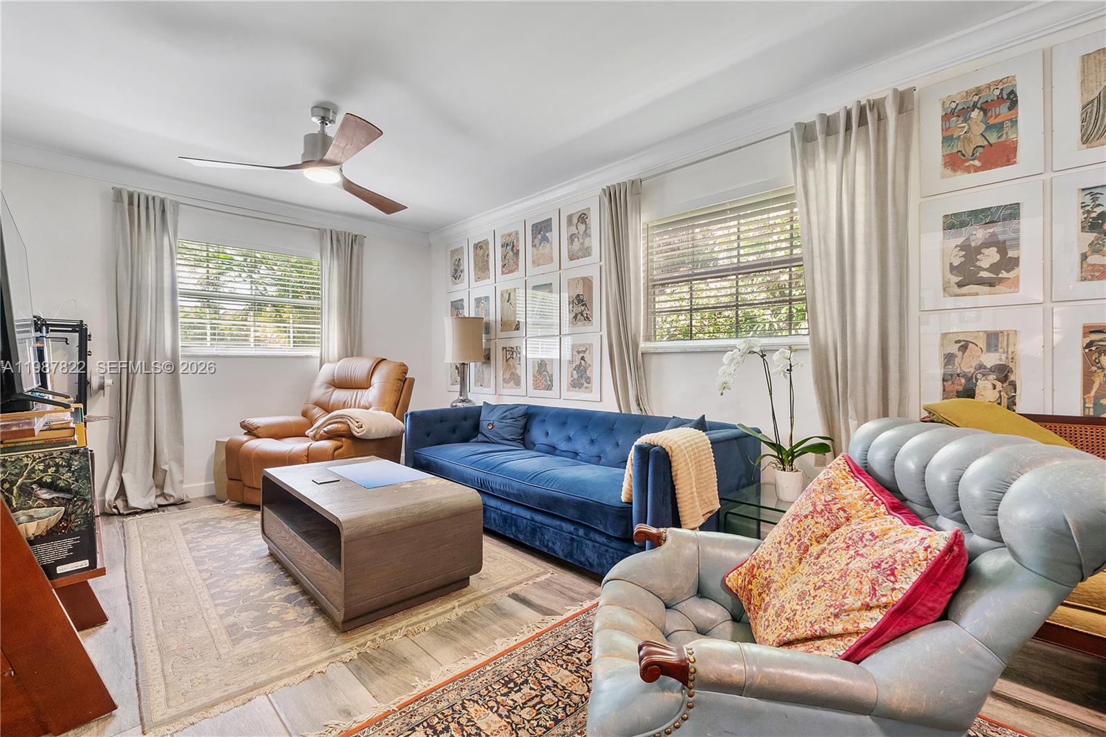 5961 Southwest 46th Terrace Miami, FL 33155 - Photo 14 of 28 a living room with furniture and a large window