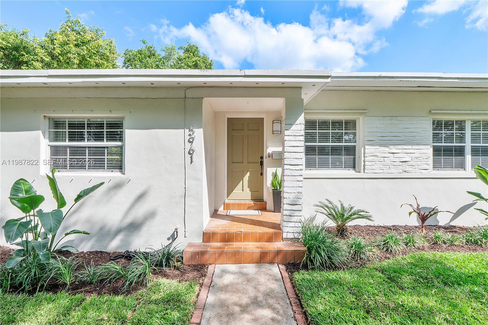 5961 Southwest 46th Terrace Miami, FL 33155 - Photo 25 of 28 a front view of a house with plants