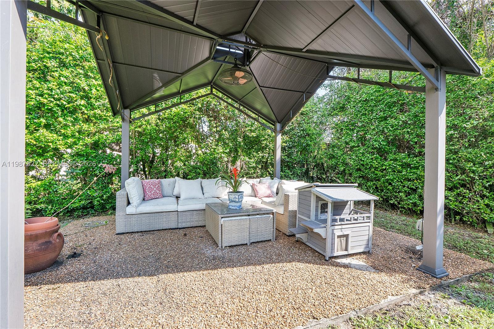 5961 Southwest 46th Terrace Miami, FL 33155 - Photo 27 of 28 a view of yard with patio