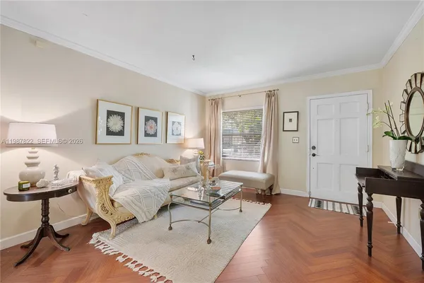 a living room with furniture and a window
