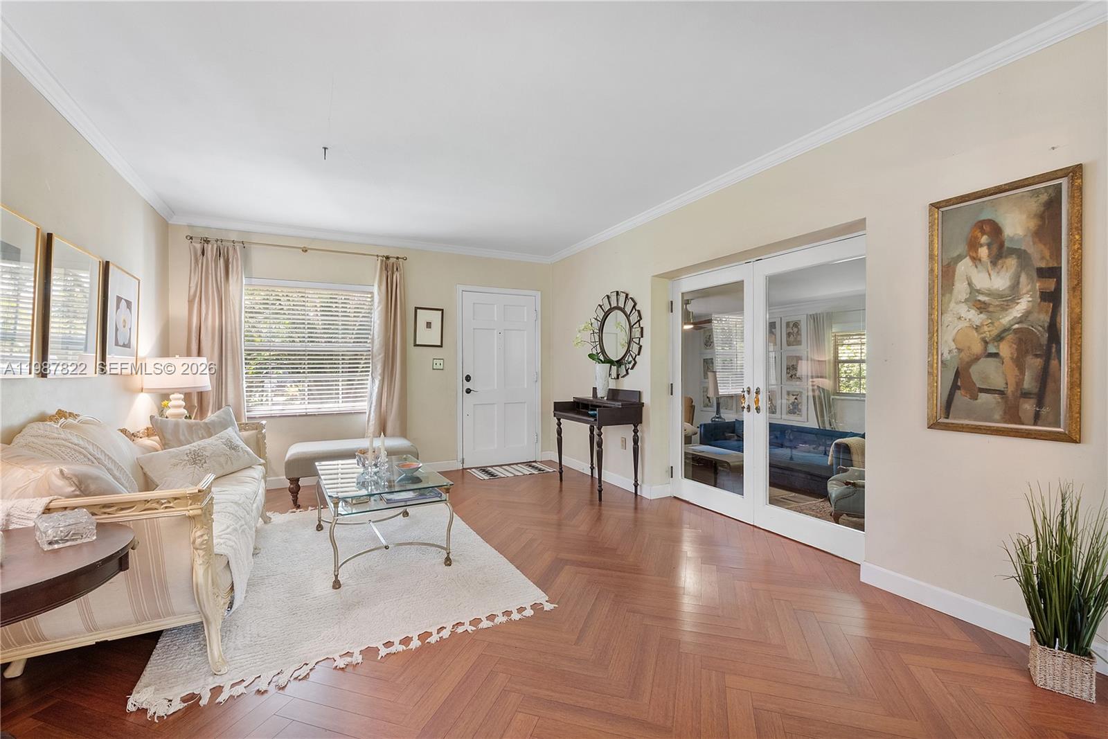 5961 Southwest 46th Terrace Miami, FL 33155 - Photo 7 of 28 a living room with furniture large window and wooden floor