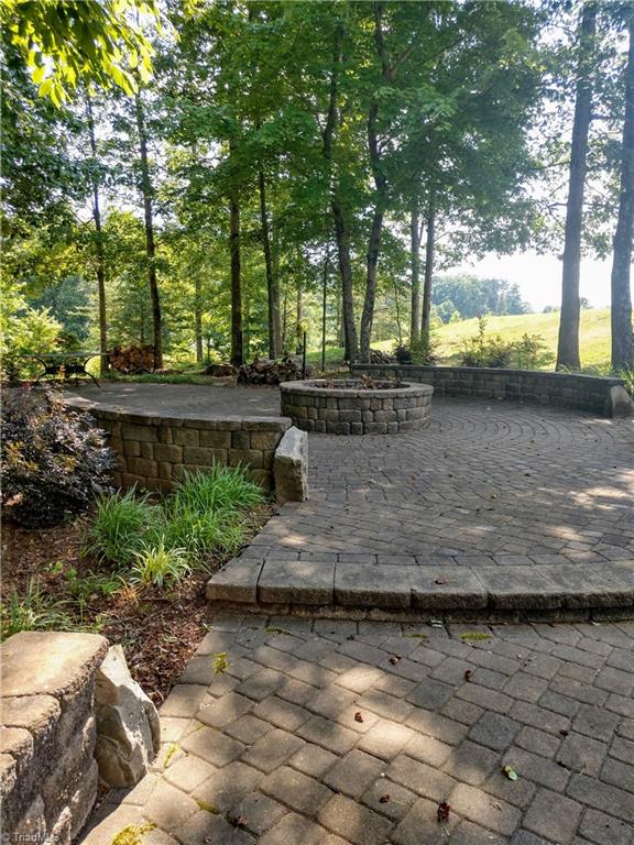 7917 Quiet Place Oak Ridge, NC 27310 - Photo 4 of 5 neighborhood fire pit