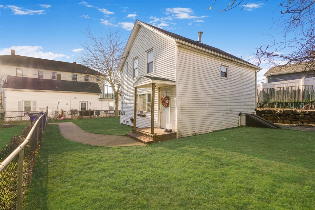 45 Boutwell Street Fall River, MA 02723 - Photo 3 of 36 a view of a house with backyard