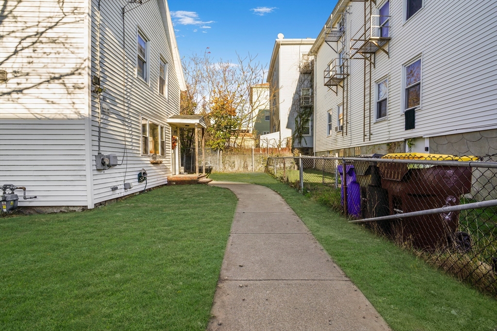 45 Boutwell Street Fall River, MA 02723 - Photo 33 of 36 a view of a house with backyard and sitting area