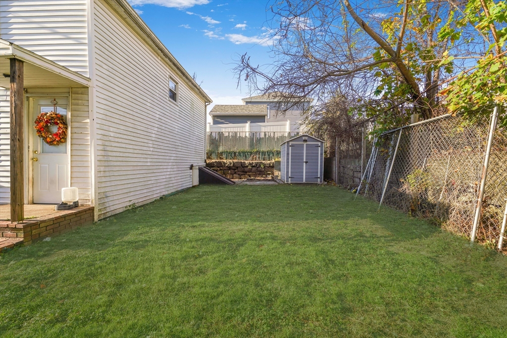45 Boutwell Street Fall River, MA 02723 - Photo 4 of 36 a view of a back yard of the house