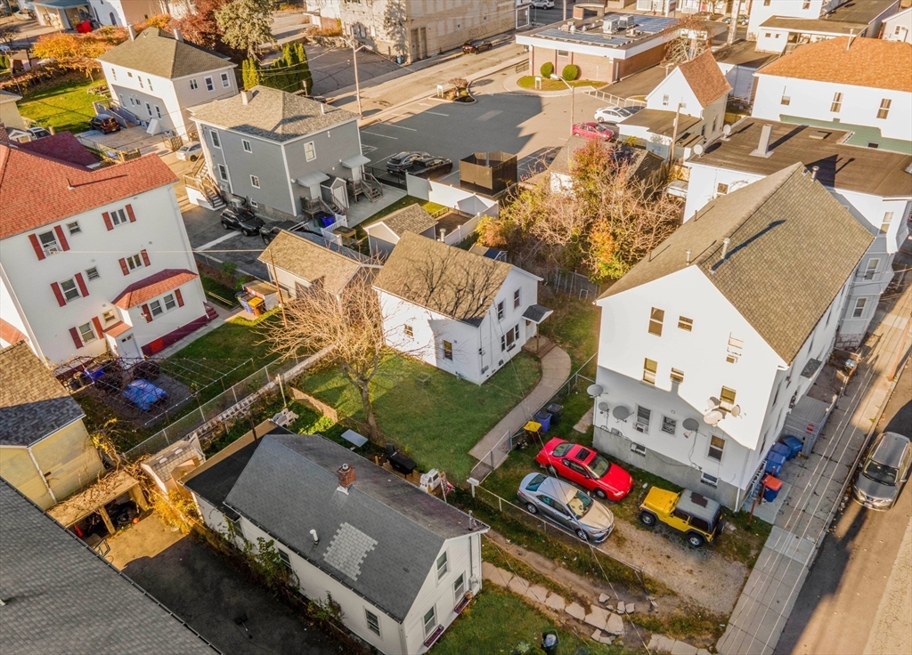 45 Boutwell Street Fall River, MA 02723 - Photo 6 of 36 an aerial view of a houses with yard