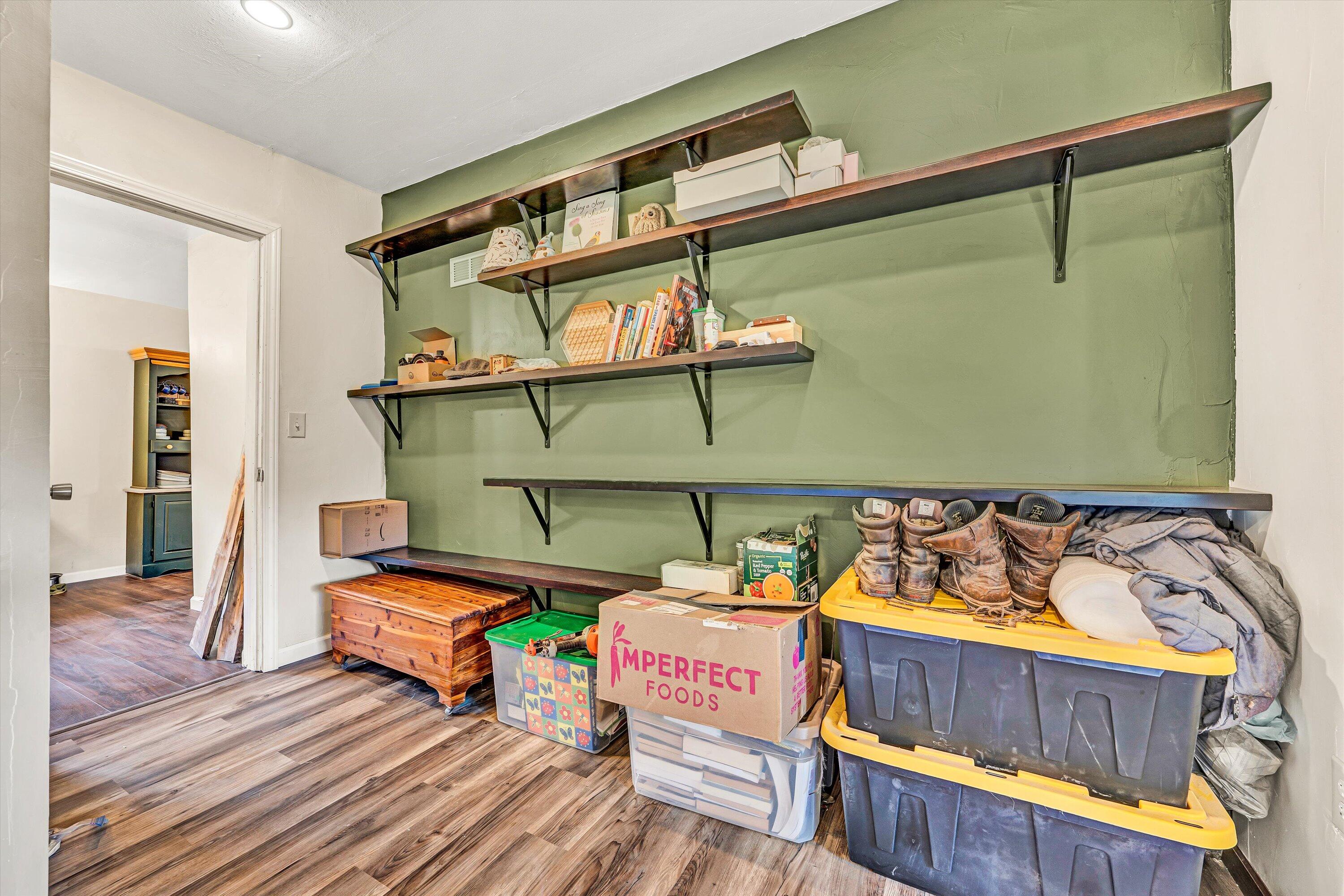 855 Algoma Road Callaway, VA 24067 - Photo 16 of 25 a room with furniture and a wooden floor