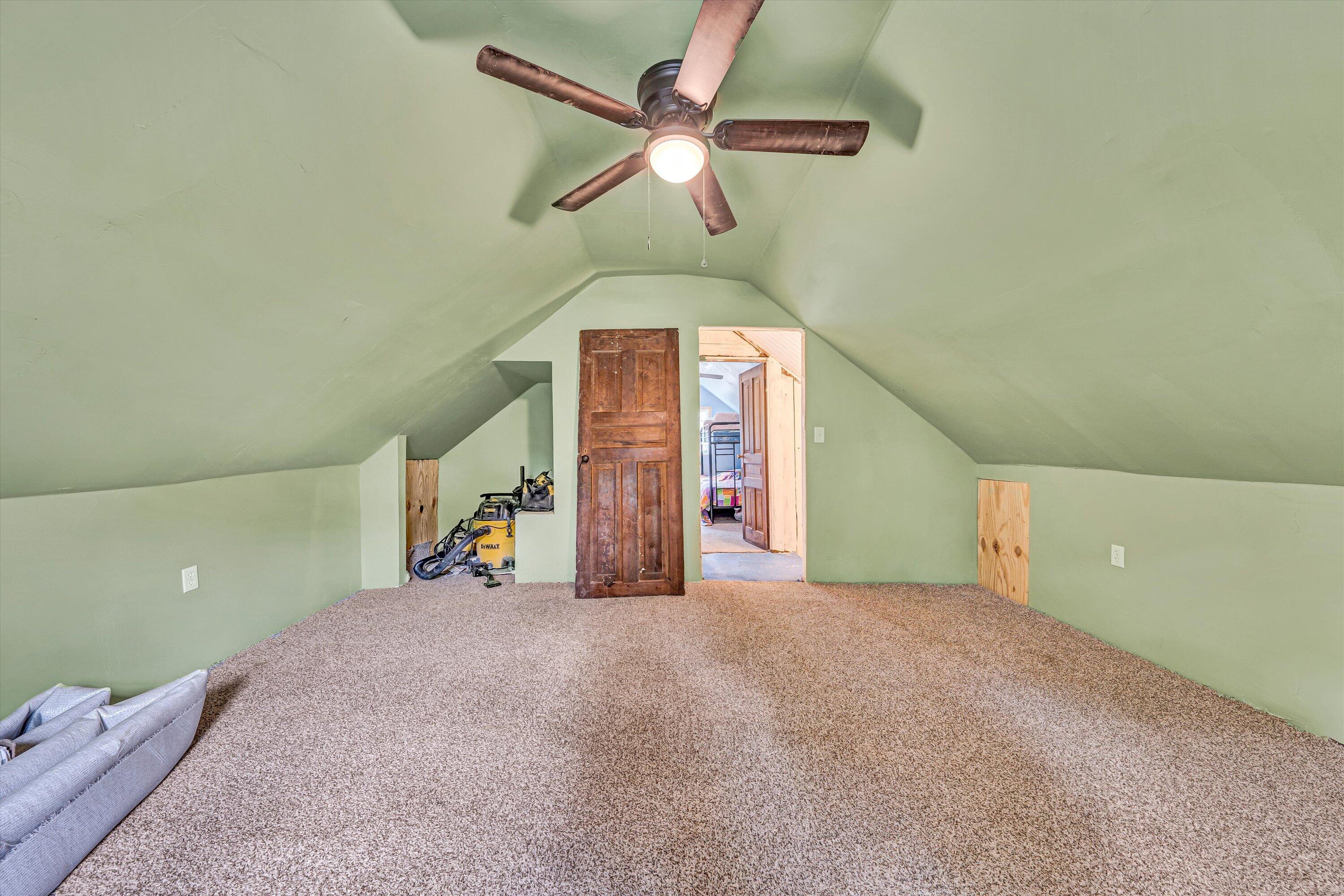 855 Algoma Road Callaway, VA 24067 - Photo 20 of 25 a view of a hallway with a ceiling fan and a window