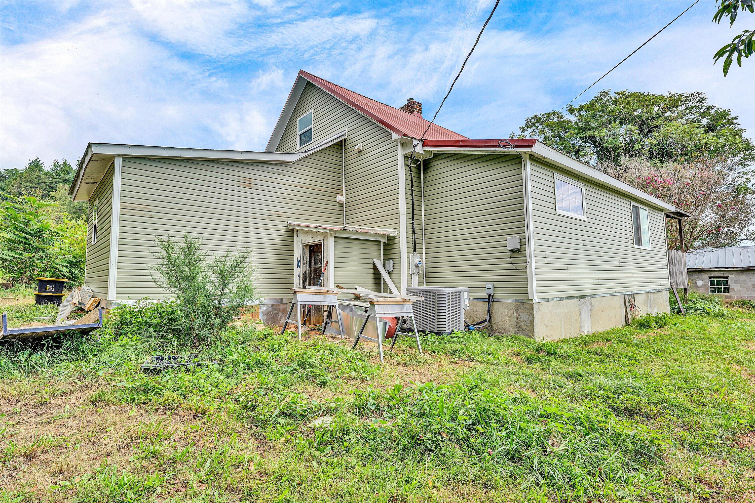 855 Algoma Road Callaway, VA 24067 - Photo 23 of 25 a front view of house with yard and green space