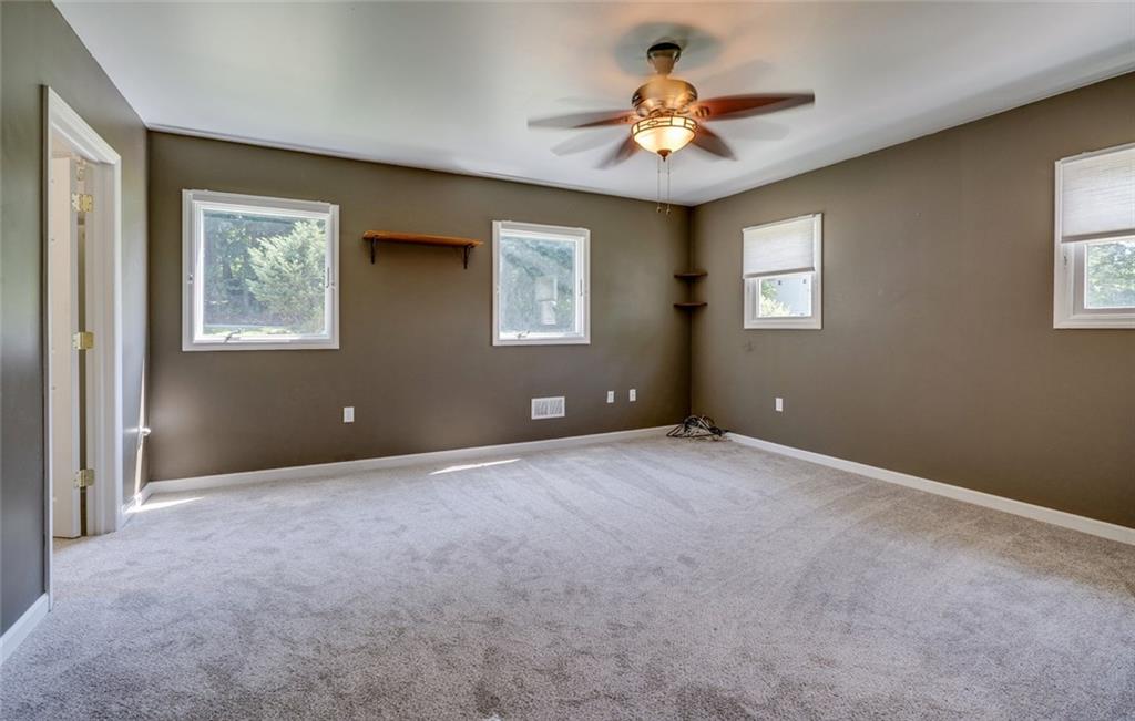 176 Churchill Road Turtle Creek, PA 15145 - Photo 16 of 25 Master bedroom with new carpet in neutral color.