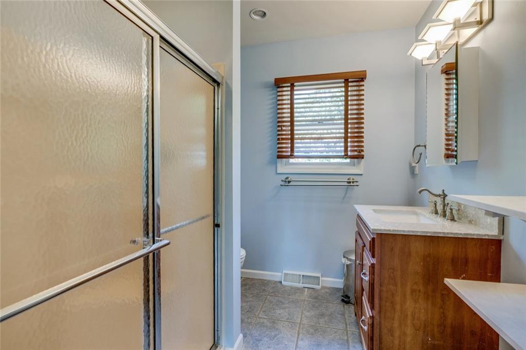 176 Churchill Road Turtle Creek, PA 15145 - Photo 18 of 25 Master bathroom with new sink and fixtures.