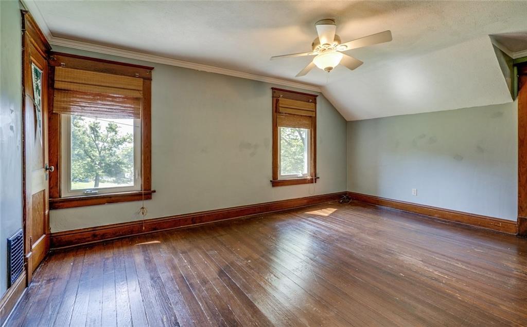 176 Churchill Road Turtle Creek, PA 15145 - Photo 20 of 25 Bedroom 2 (12x 16) with original hardwood floor and details. 2 closets.