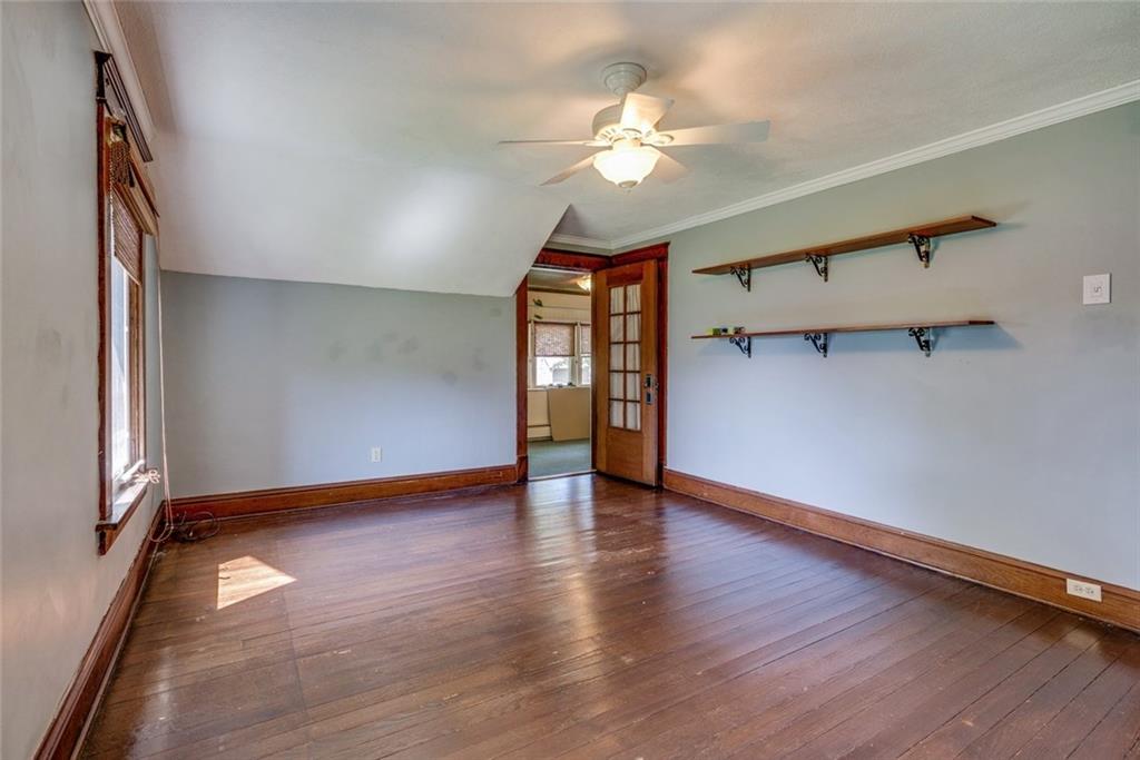176 Churchill Road Turtle Creek, PA 15145 - Photo 21 of 25 Bedroom 2 and glass door to the captive room.