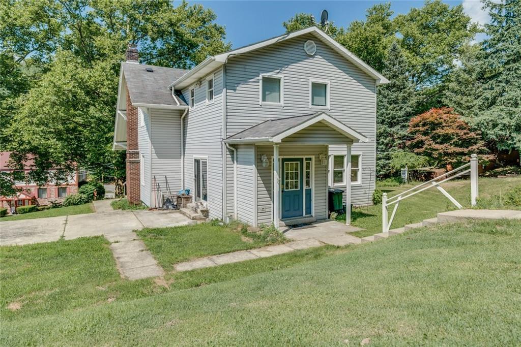 176 Churchill Road Turtle Creek, PA 15145 - Photo 24 of 25 Back door with side patio.