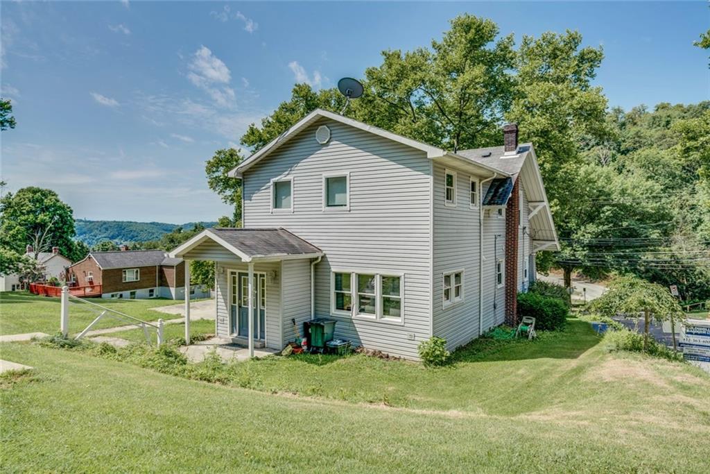 176 Churchill Road Turtle Creek, PA 15145 - Photo 25 of 25 Back of the house corner Negley and Churchill Lane with 2 plus off street parking.