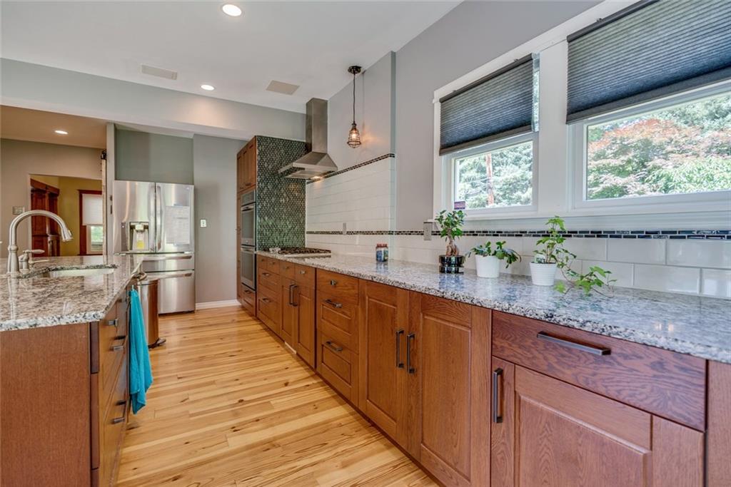176 Churchill Road Turtle Creek, PA 15145 - Photo 4 of 25 Kitchen with beautiful counter top and island.