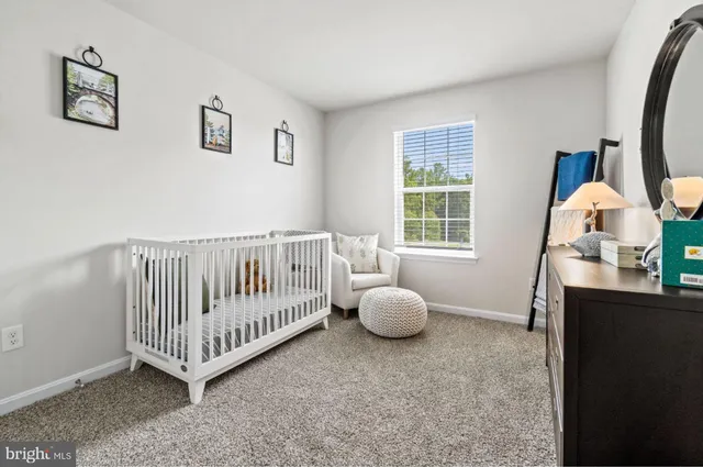 a view of livingroom with furniture and window