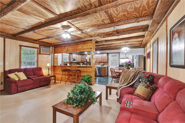 a living room with furniture garage and a table