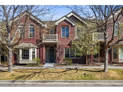 a front view of a house with garage