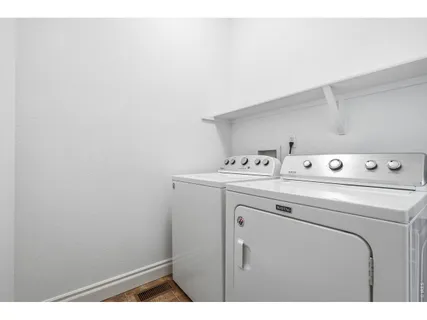 a view of balcony with wooden floor