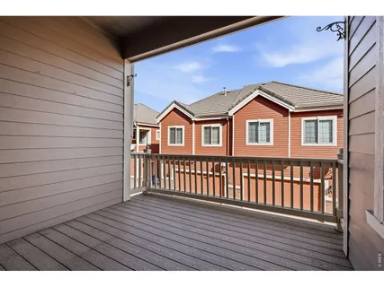 a view of outdoor space and wooden deck