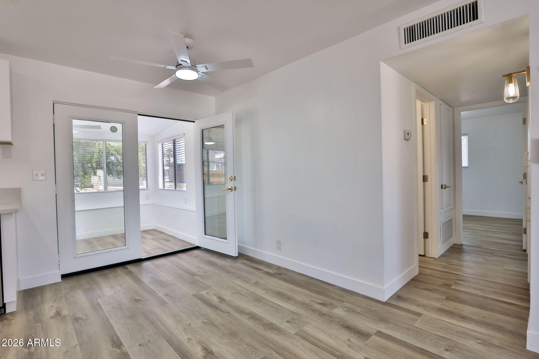 5510 East Dallas Street Mesa, AZ 85205 - Photo 6 of 24 a view of a room with wooden floor