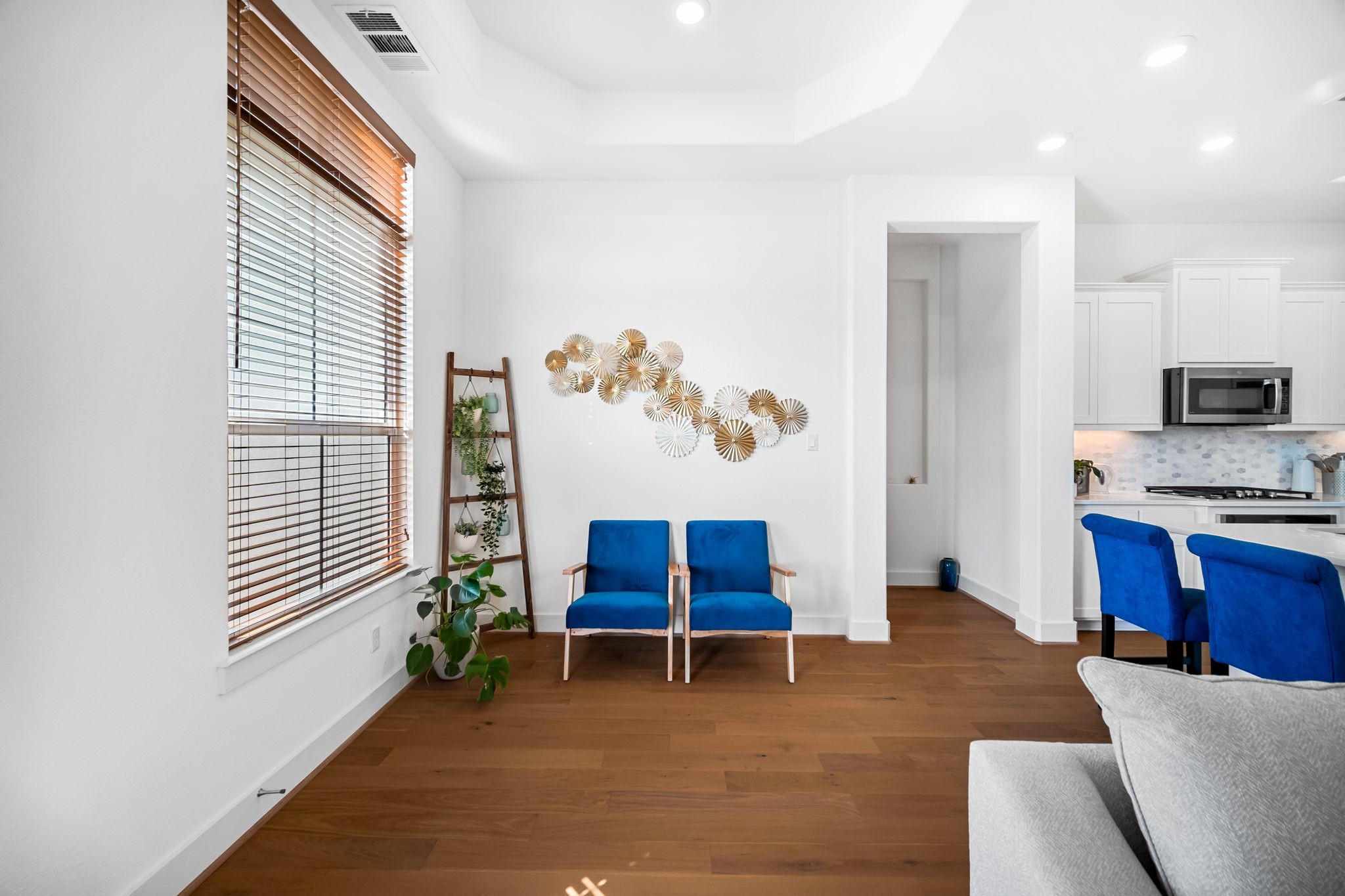 303 Cartwheel Bend Austin, TX 78738 - Photo 12 of 25 a living room with furniture and a window