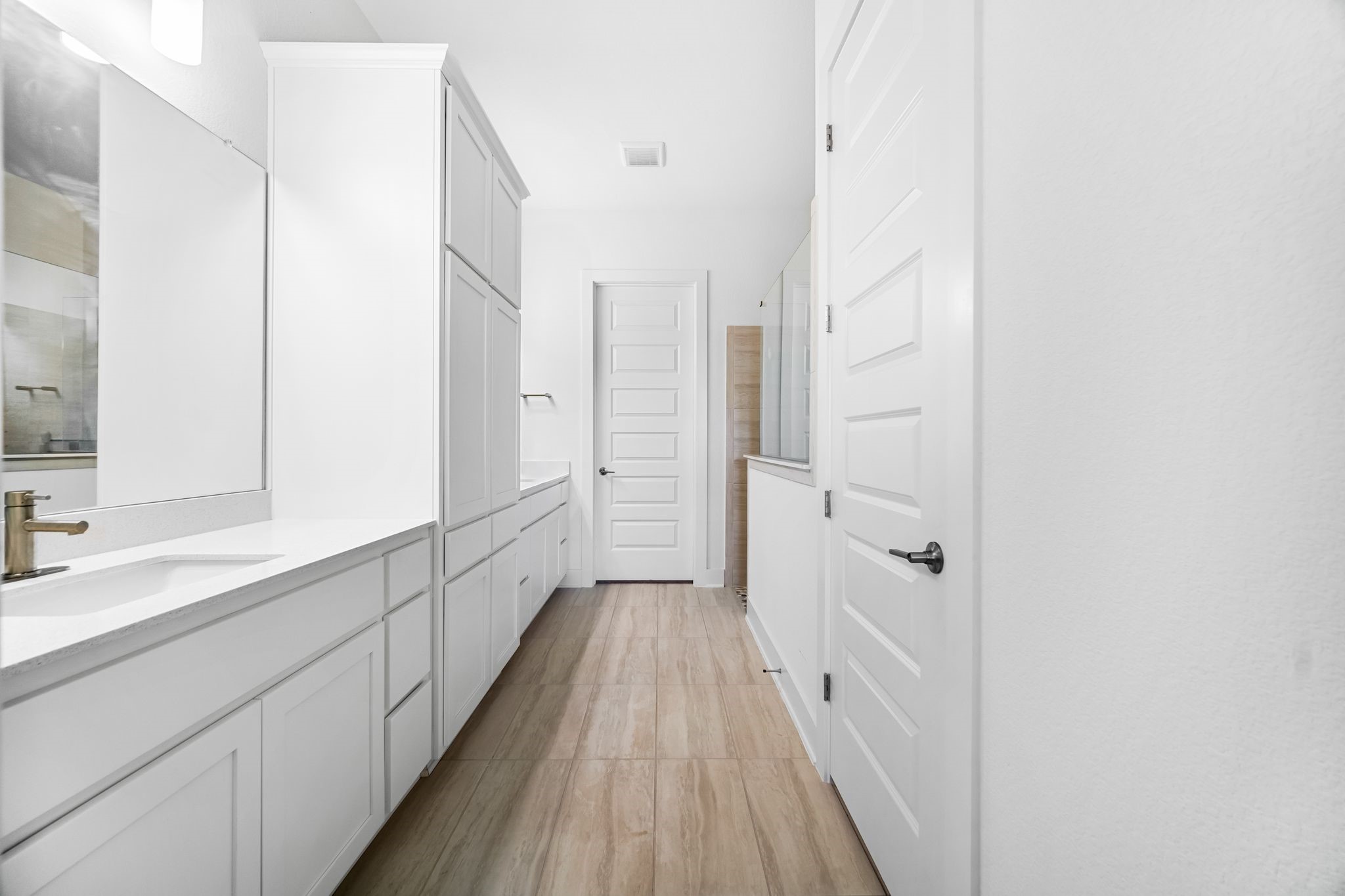 303 Cartwheel Bend Austin, TX 78738 - Photo 16 of 25 a bathroom with a double vanity sink and mirror