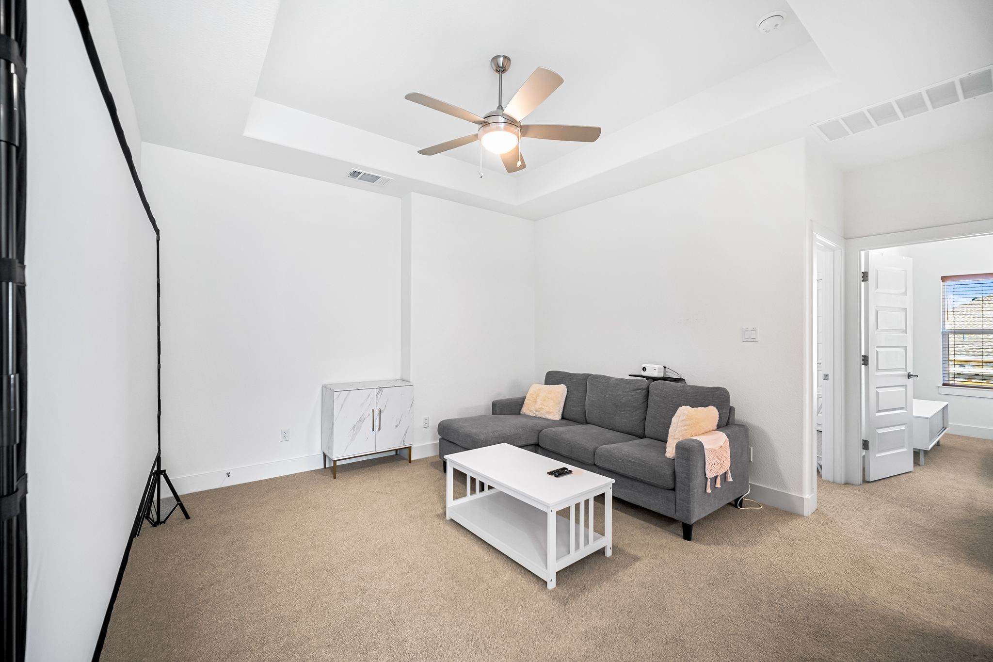 303 Cartwheel Bend Austin, TX 78738 - Photo 18 of 25 a living room with furniture and white walls