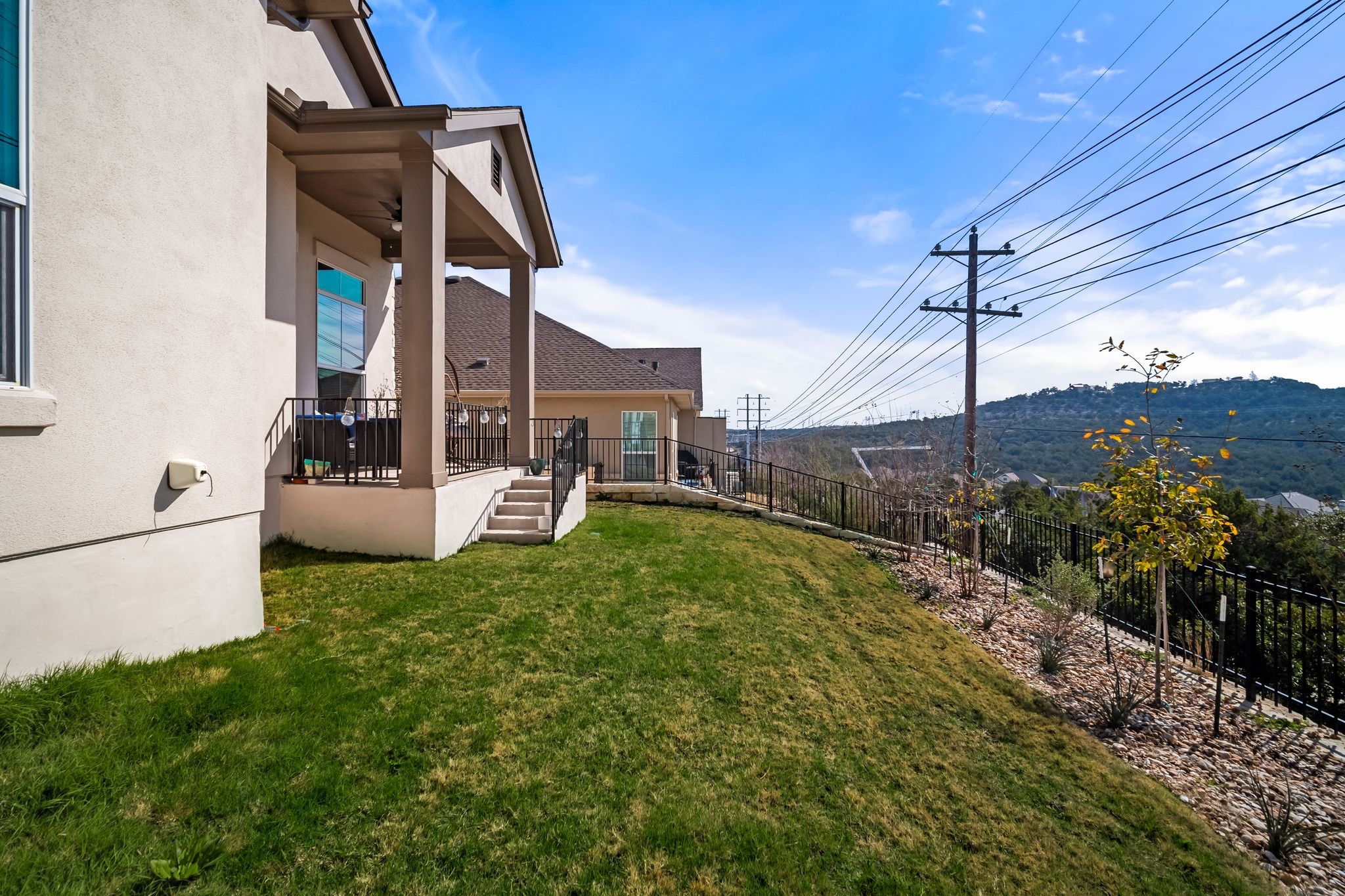 303 Cartwheel Bend Austin, TX 78738 - Photo 25 of 25 a view of a house with a park