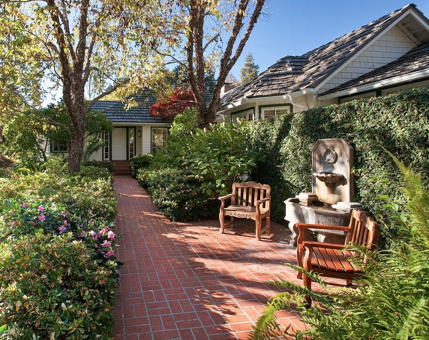 396 Hot Springs Road Montecito, CA 93108 - Photo 1 of 17 a view of a chairs and table in the patio