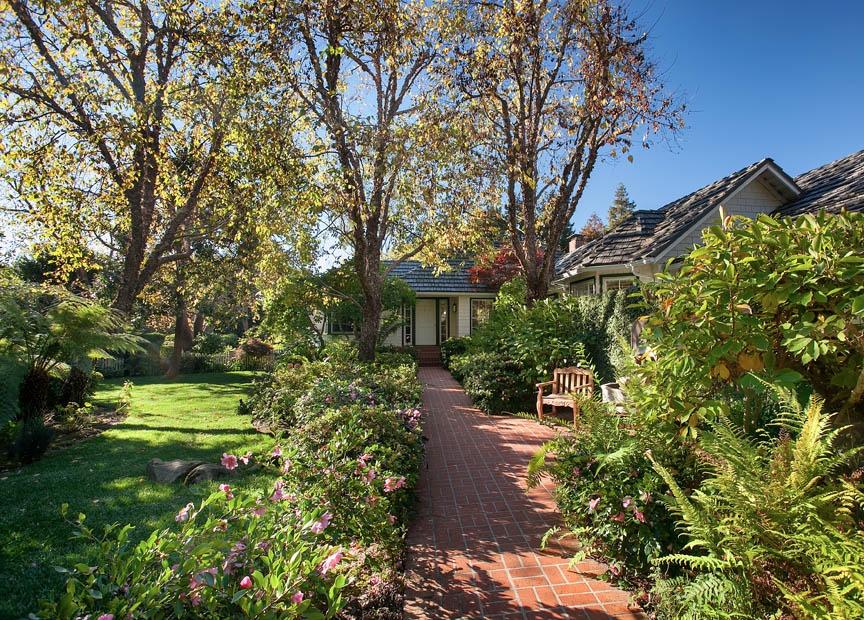 396 Hot Springs Road Montecito, CA 93108 - Photo 2 of 17 a front view of a house with a yard