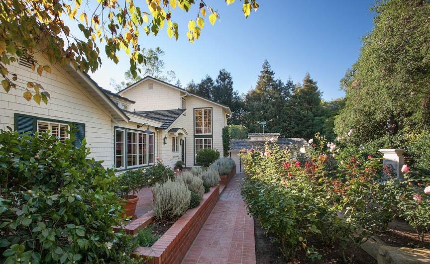 396 Hot Springs Road Montecito, CA 93108 - Photo 4 of 17 a house that has a lot of plants in it