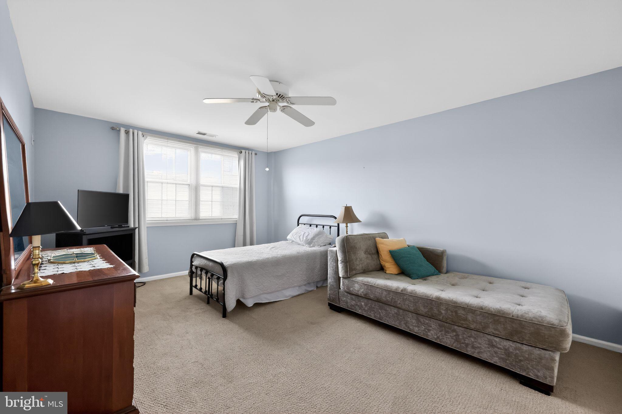 213 Haddonfield Cmns, Unit 213 Haddonfield, NJ 08033 - Photo 20 of 35 Serene bedroom with soft blue hues.