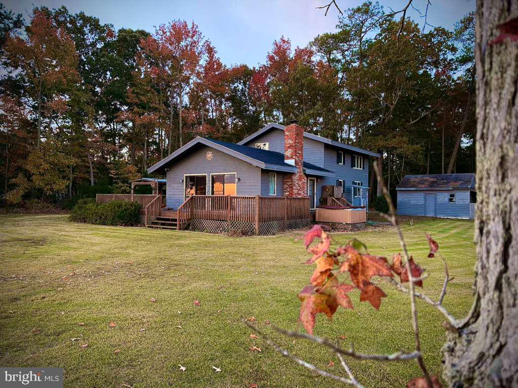 310 Brush Neck Road Susan, VA 23163 - Photo 29 of 70 a front view of a house with garden