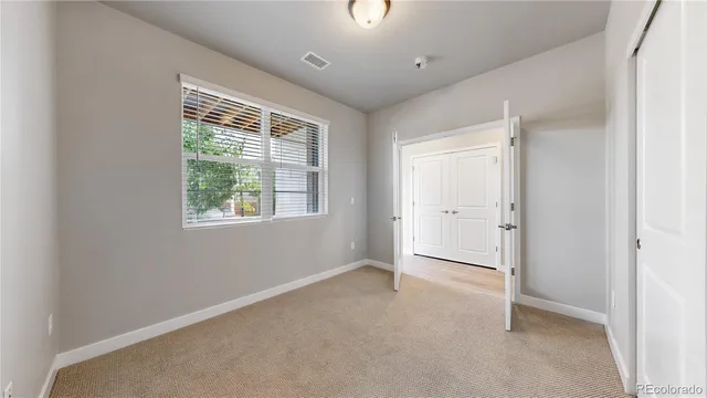 a bathroom with a sink toilet and a mirror