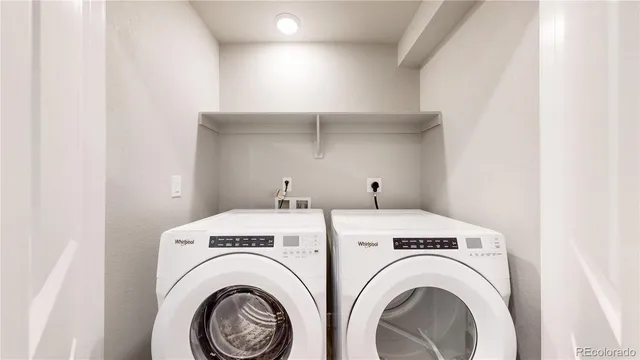a view of a balcony with wooden floor