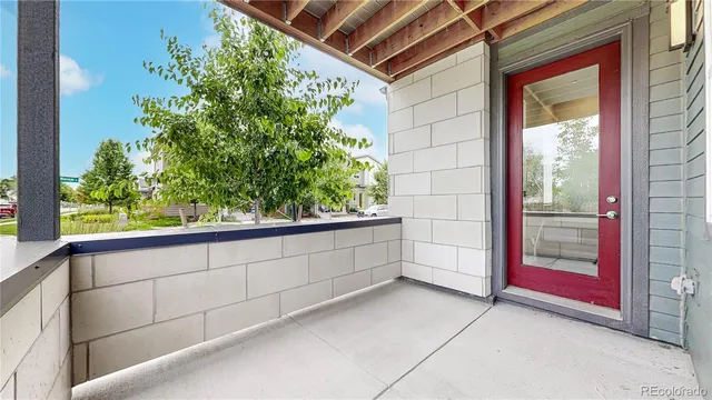 a small white building with a white roof