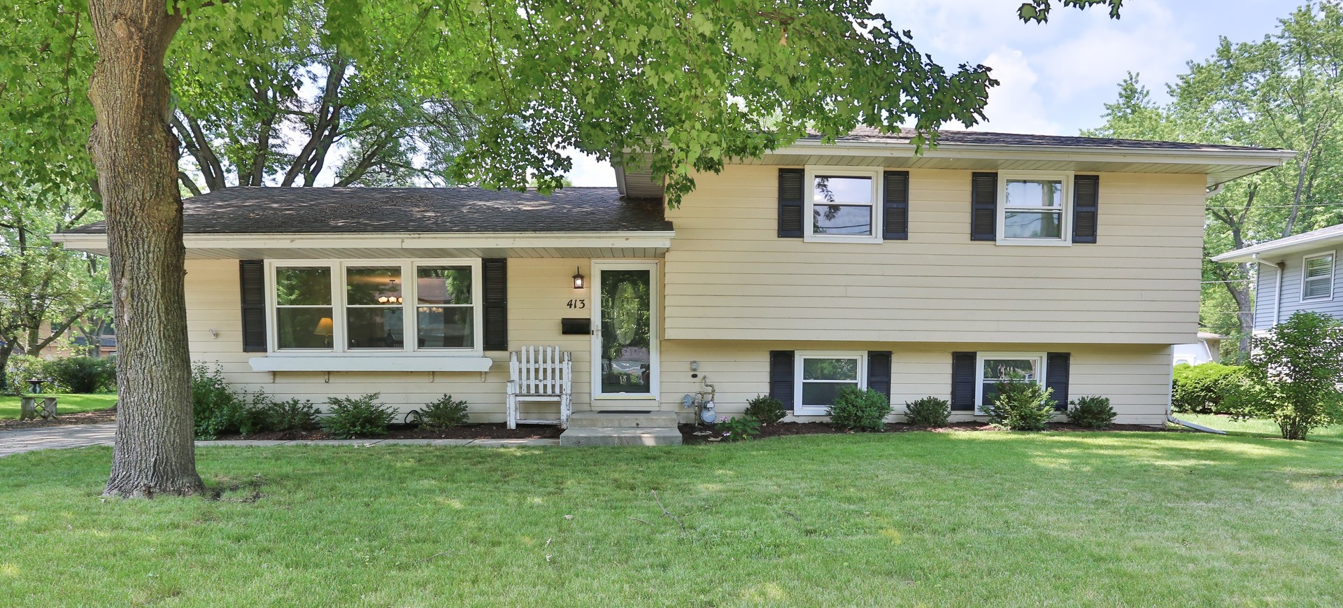 413 West Gartner Road Naperville, IL 60540 - Photo 1 of 22 front view of a house and a yard