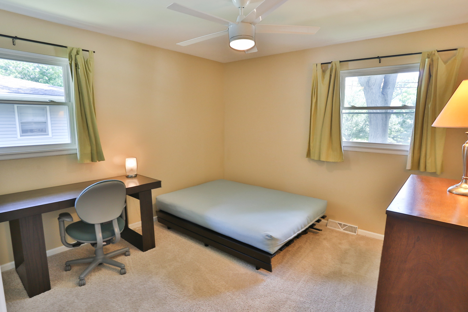 413 West Gartner Road Naperville, IL 60540 - Photo 15 of 22 a bedroom with a bed and a window