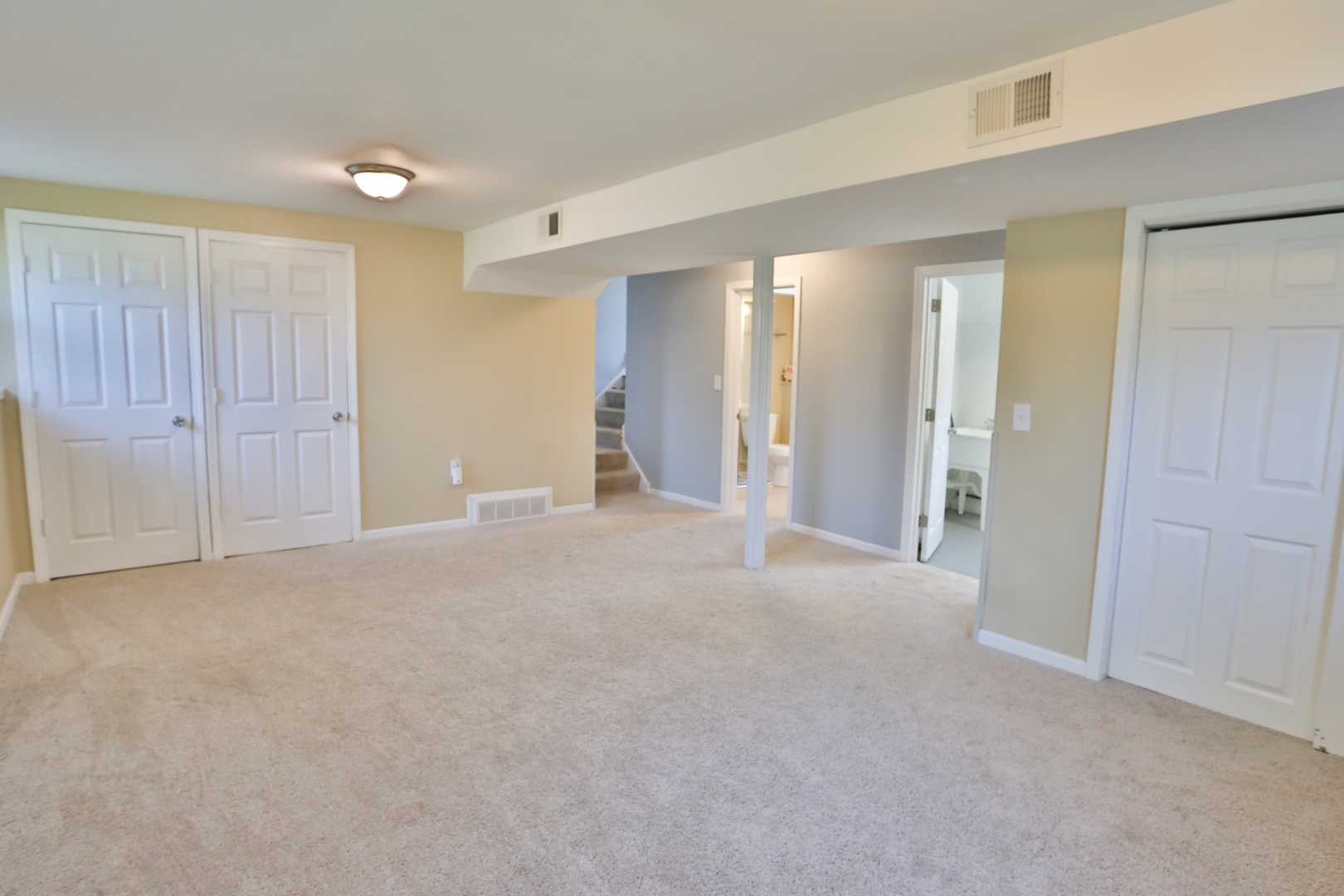413 West Gartner Road Naperville, IL 60540 - Photo 10 of 22 a view of a big room with closet and windows