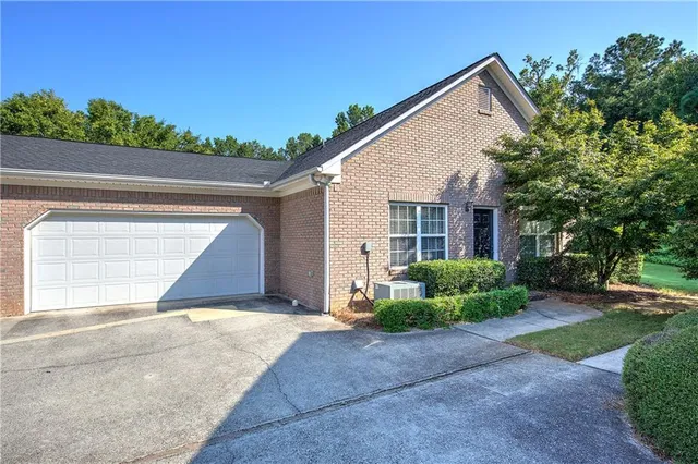 front view of a house and a yard