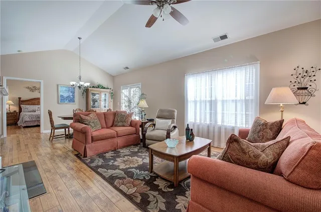 a living room with furniture or couch and a window