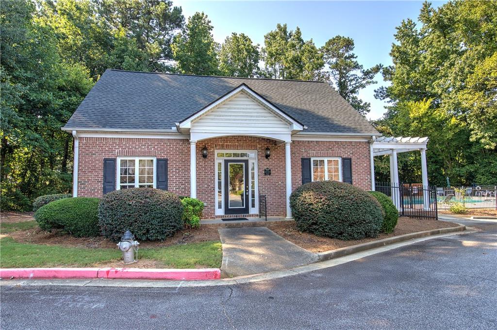 3383 Raes Creek Road, Unit 4 Marietta, GA 30008 - Photo 39 of 41 a house view with a garden space