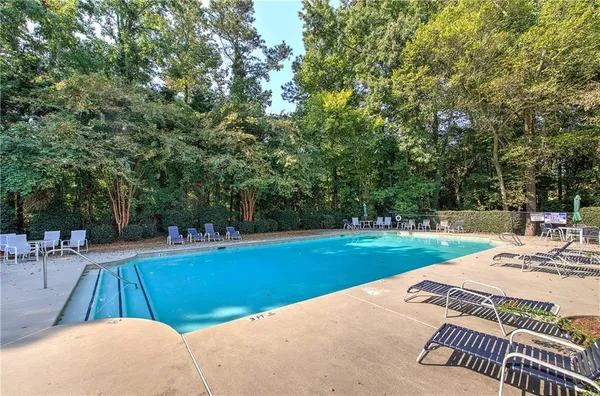 a view of a backyard with a patio