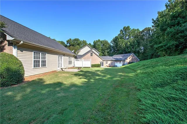 a house view with a garden space