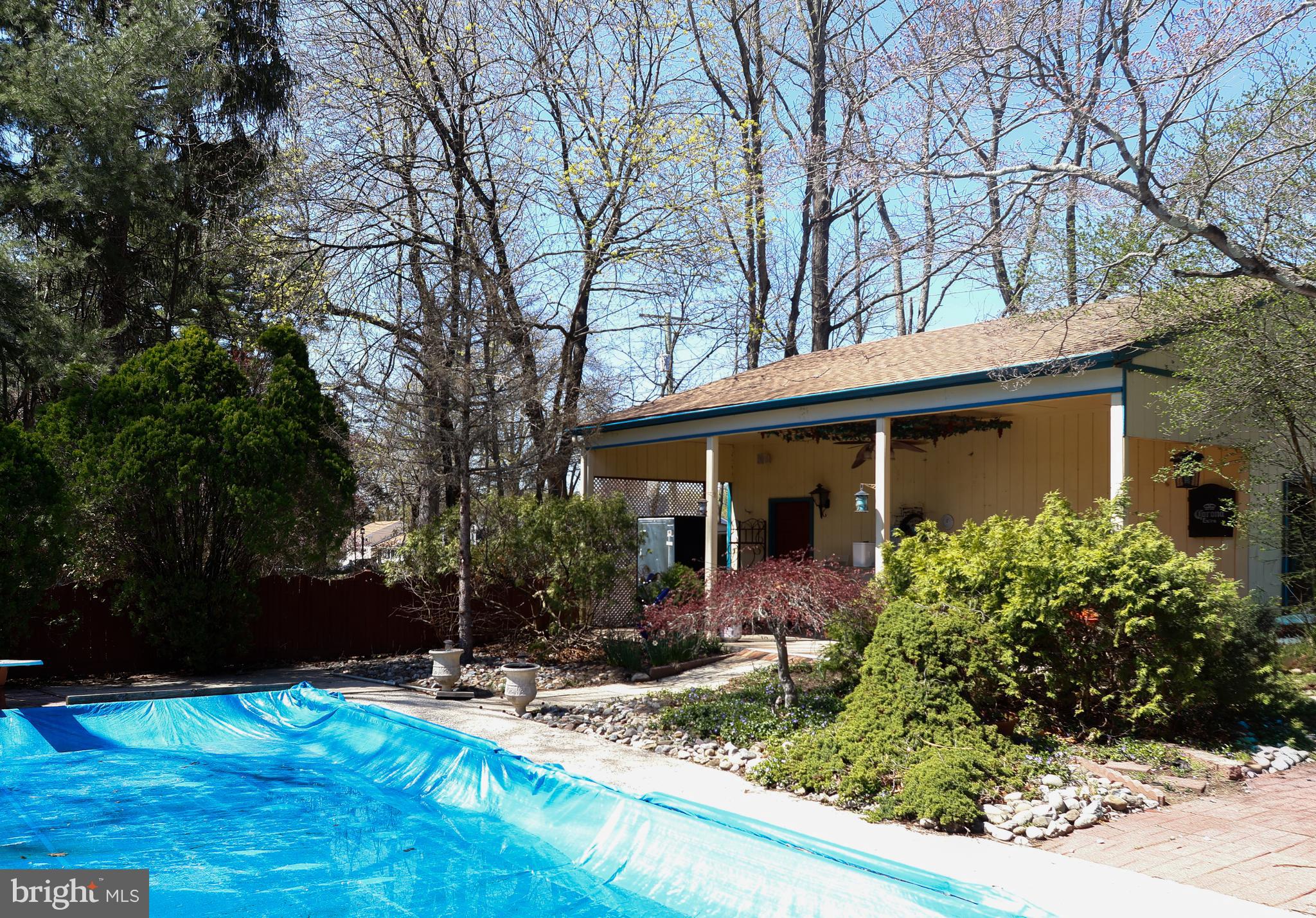 53 Kirkwood Road Gibbsboro, NJ 08026 - Photo 36 of 37 Side view of pool and garage overhang