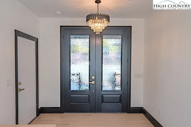 a view of living room with furniture and a flat screen tv
